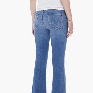Mother Weekender Fray. Mid-rise flare has a 31” inseam and a raw hem.